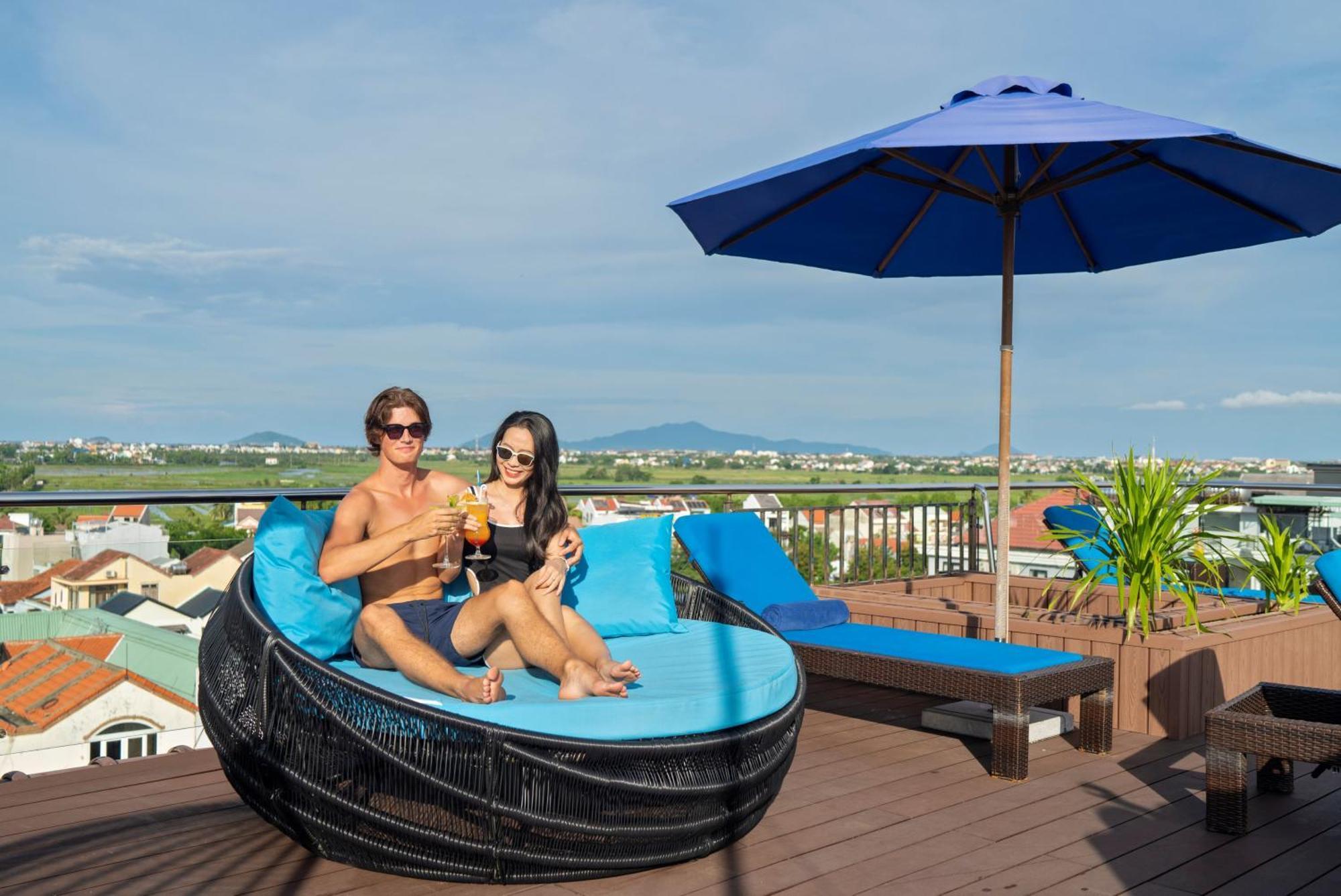 Qualia De Hotel Hoi An - Rooftop Bar City View Bagian luar foto