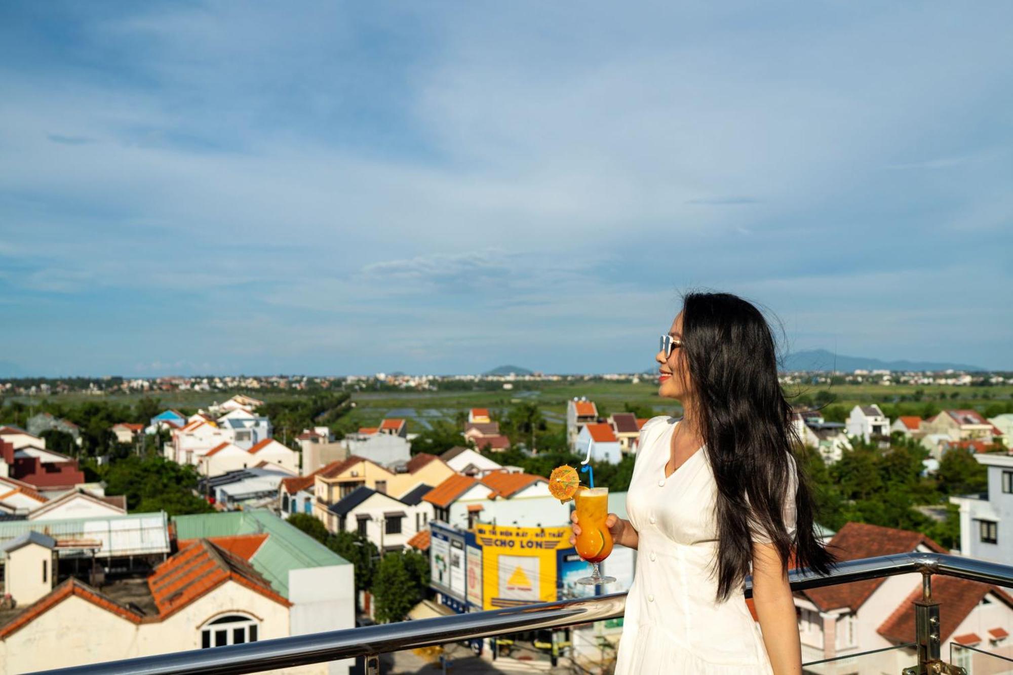 Qualia De Hotel Hoi An - Rooftop Bar City View Bagian luar foto
